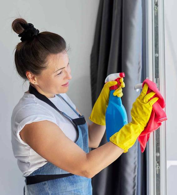 woman-cleaning-window